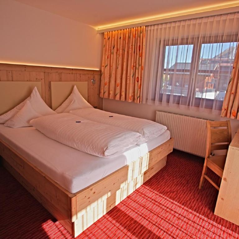 Pension Walserheim - Doppelzimmer mit Badewanne - 5
