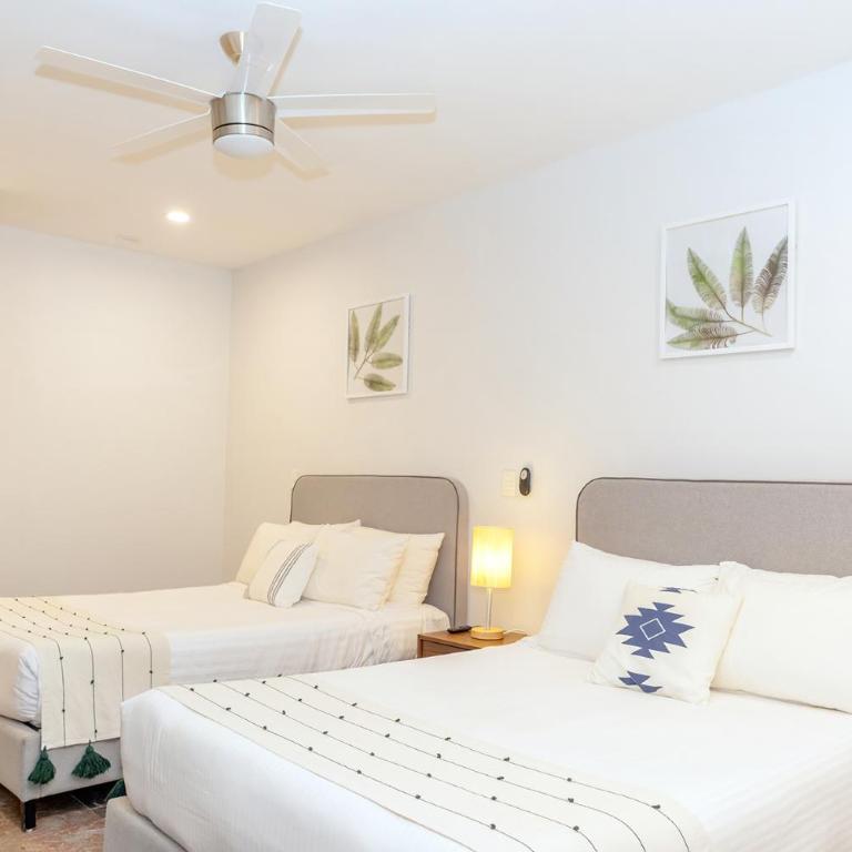 It Beach Condo - Two-Bedroom Apartment with Balcony and Sea View - 26