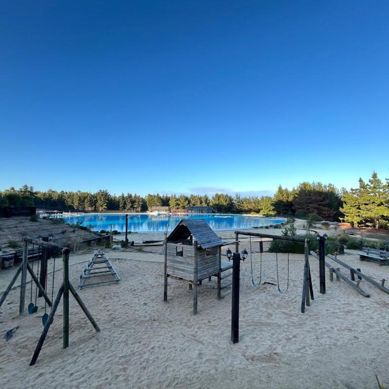 Depto Frente a Laguna y Patio Privado - Two-Bedroom Apartment - 1