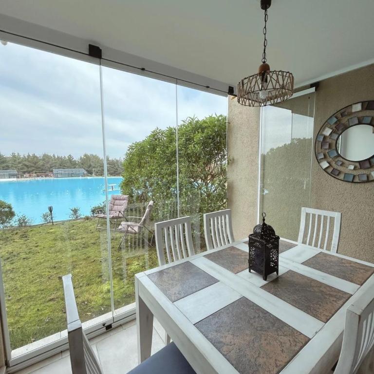Depto Frente a Laguna y Patio Privado - Two-Bedroom Apartment - 25