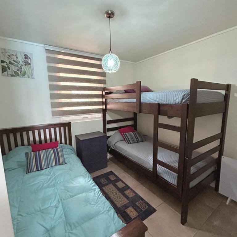 Depto Frente a Laguna y Patio Privado - Two-Bedroom Apartment - 33