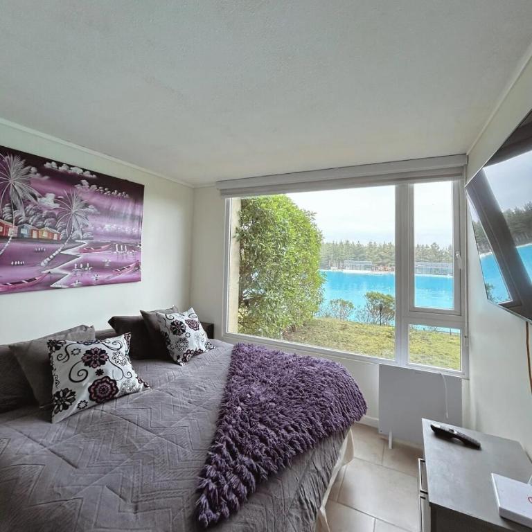 Depto Frente a Laguna y Patio Privado - Two-Bedroom Apartment - 35