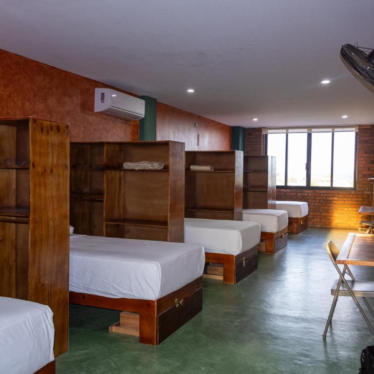 Madre Tierra Hostal - Cama Individual en habitación compartida femenina - 16