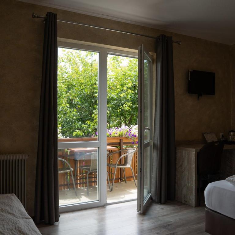 Haus Kärnten - Dreibettzimmer mit Balkon - 2
