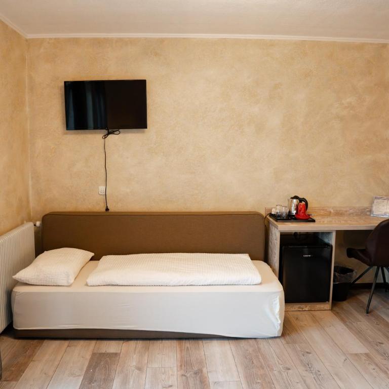 Haus Kärnten - Vierbettzimmer mit Balkon - 10