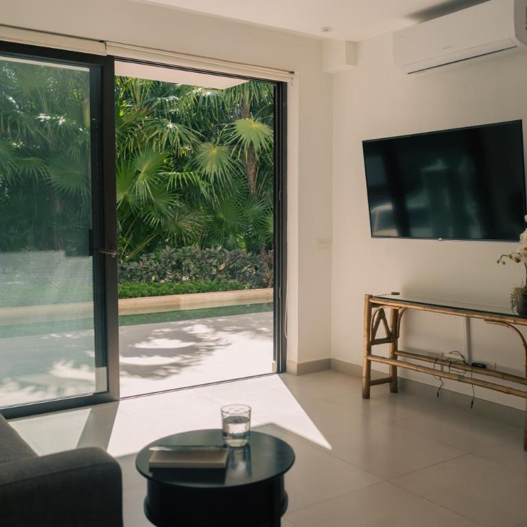 Bright 2BR Apartment with Terrace & Pool, Lorena Ochoa Residences - Two-Bedroom Apartment - 20
