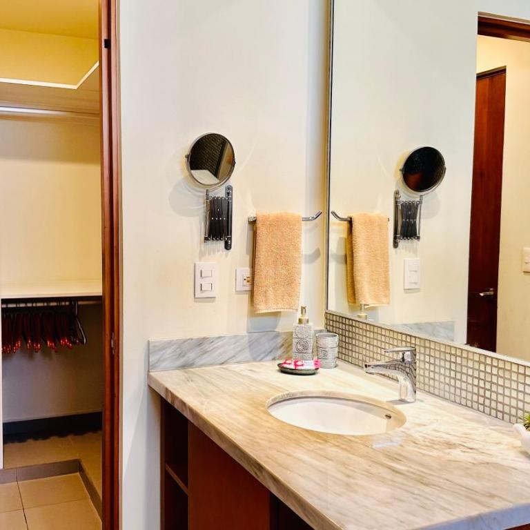 Lunada PH with Private Rooftop and Jacuzzi by Caribe Rentas - Two-Bedroom Apartment - 19