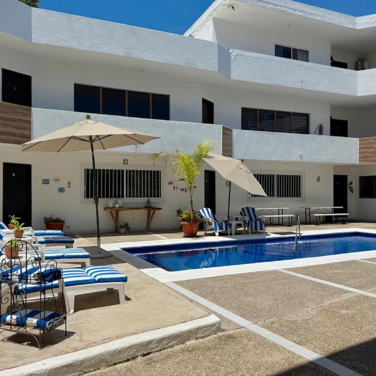 Loft a pocas cuadras de la playa y Zona Dorada - One-Bedroom Apartment - 31