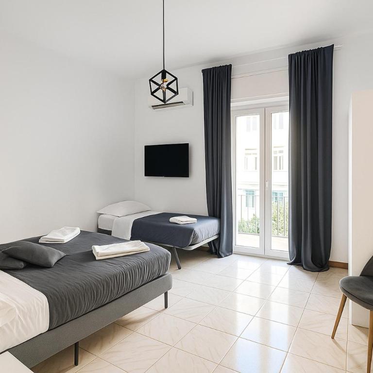 Nella's Carlo III Apartment - Two-Bedroom Apartment - 35