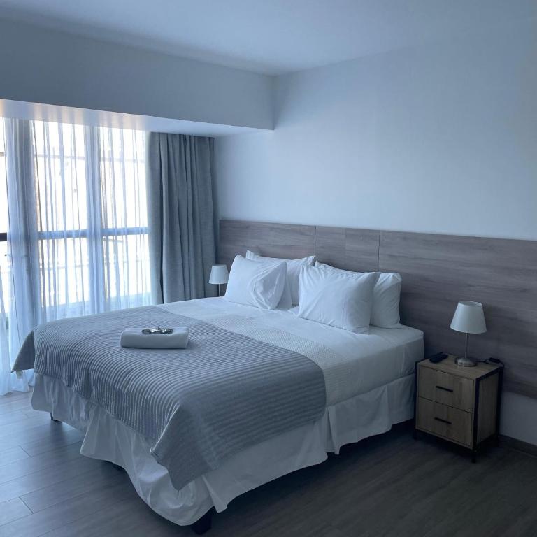 Urban Suites Apart Hotel con Estacionamiento Gratuito - Studio Apartment with King Bed - 1