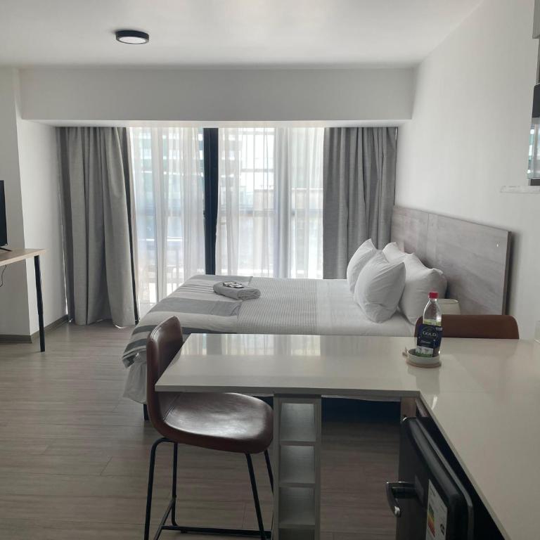 Urban Suites Apart Hotel con Estacionamiento Gratuito - Studio Apartment with King Bed - 6