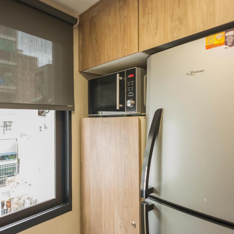 Vive con confort, diseño y balcón - Apartamento de 1 dormitorio - 32