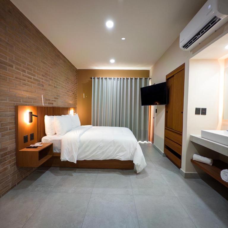 Kooch Aparthotel - Apartamento Deluxe - 29