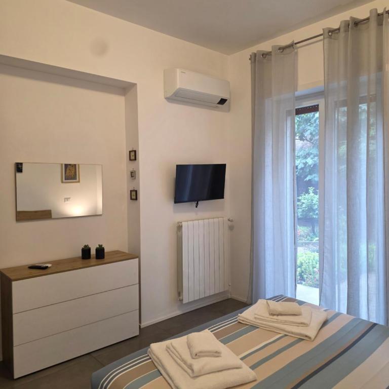 Alloggio Turistico A casa di Anna - Appartamento con 2 Camere da Letto e Vista Giardino - 3