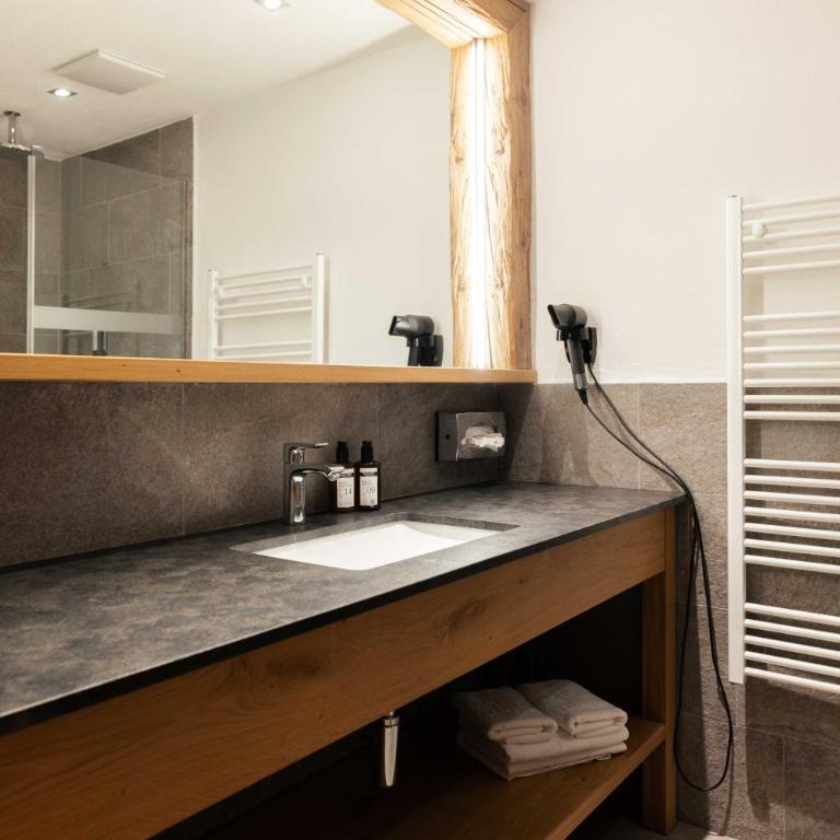 Hotel Quellenhof - Doppelzimmer mit Terrasse - 4