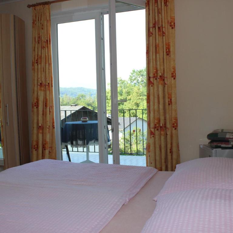 Haus Luca Seeblick - Doppel-/Zweibettzimmer mit Balkon und Seeblick - 8