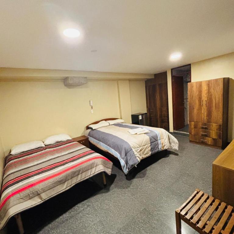 Hotel Ruiz - Cajamarca - Habitación Doble Superior - 2 camas dobles - 1