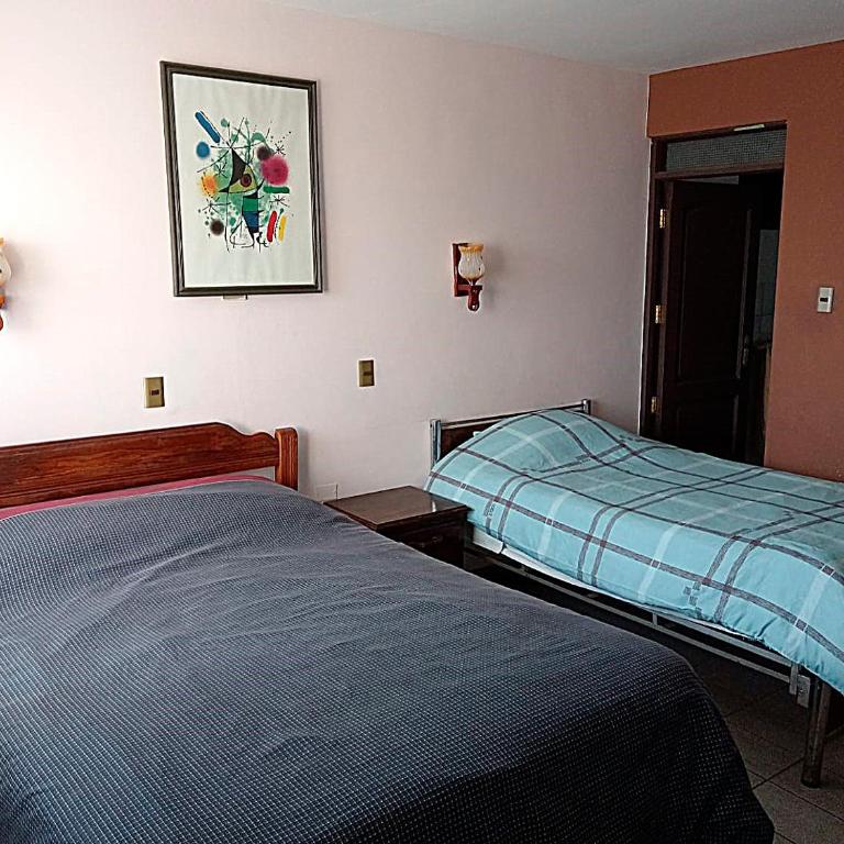 La Casa Discreta Cochabamba - Habitación Triple con baño privado - 1