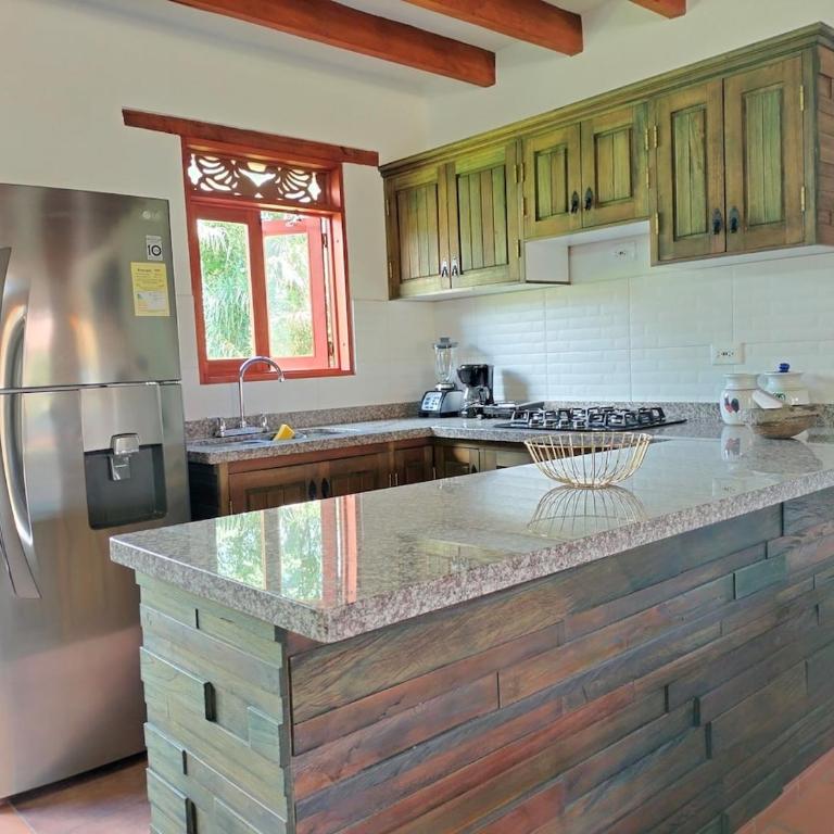 Cabaña para grupos con Parrilla & Hamacas - Apartment - 18