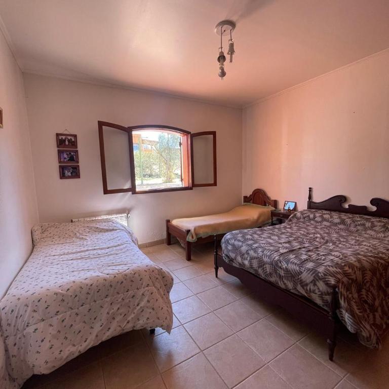 Abrazo del tiempo - Four-Bedroom House - 12