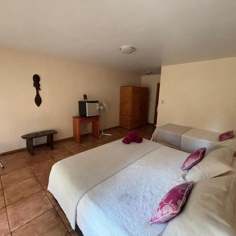 Hotel O'Hiro Rapa Nui - Habitación Triple con vistas al jardín - 12