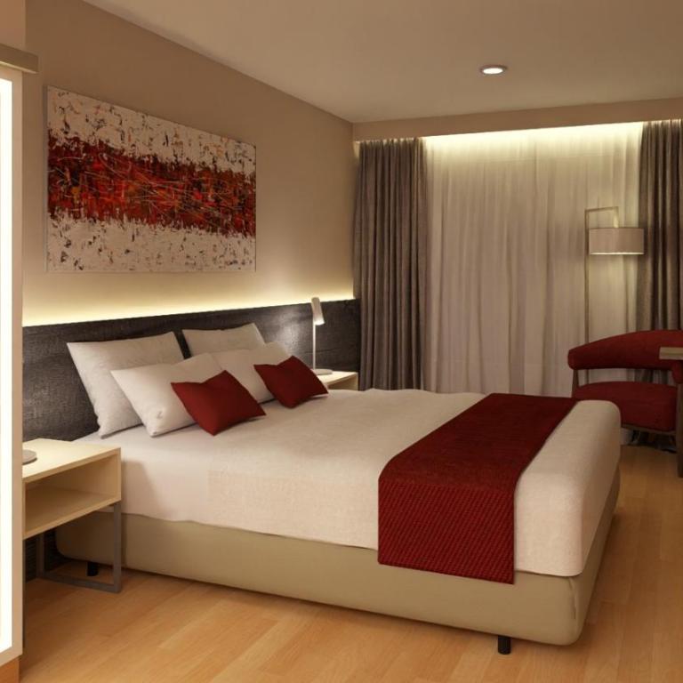 Ramada Suites by Wyndham Asuncion Aeropuerto - Superior Room with One King Bed and Two Single Beds - Non-Smoking - 1