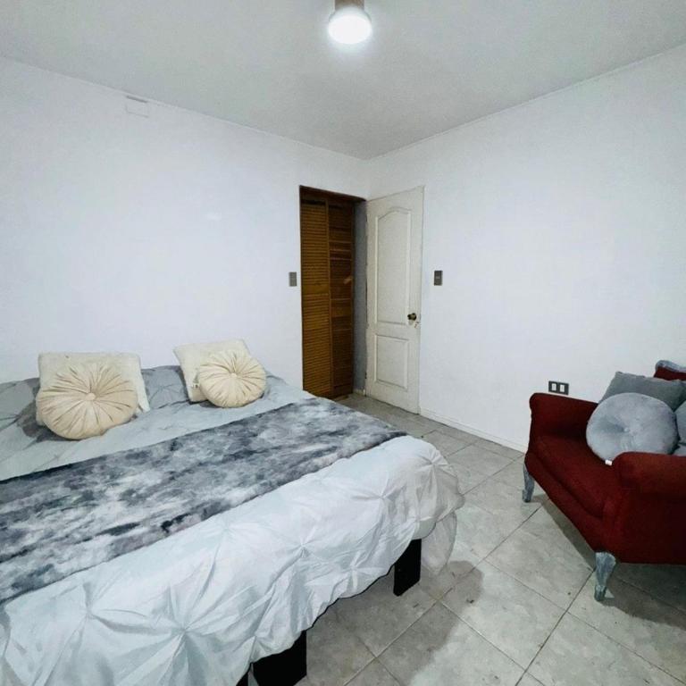 Acogedora casa - Three-Bedroom House - 16
