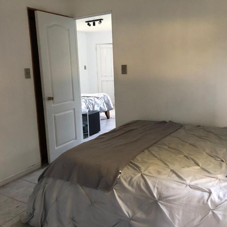 Acogedora casa - Three-Bedroom House - 18