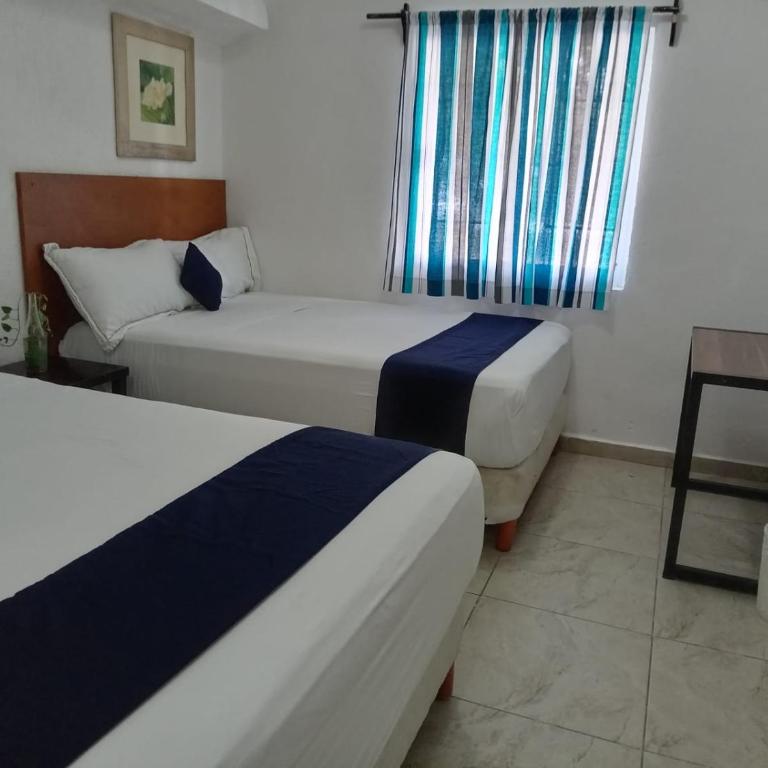Íkaro Suites Cancún - Habitación Doble - 2 camas - 11