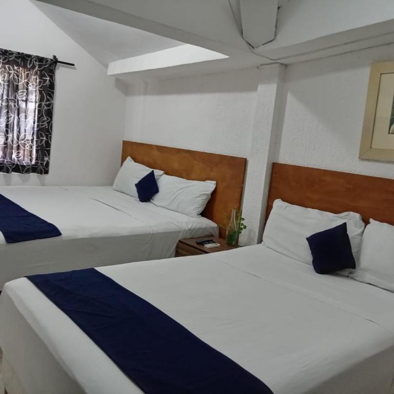 Íkaro Suites Cancún - Habitación Doble - 2 camas - 12