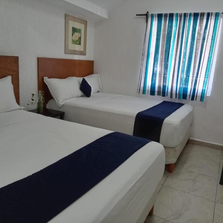 Íkaro Suites Cancún - Habitación Doble - 2 camas - 14