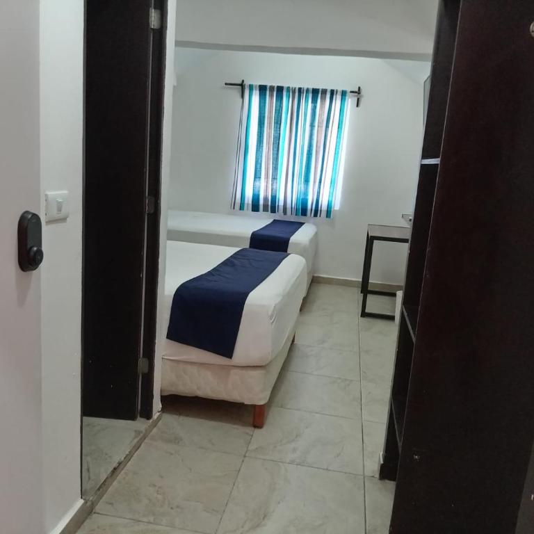 Íkaro Suites Cancún - Habitación Doble - 2 camas - 17