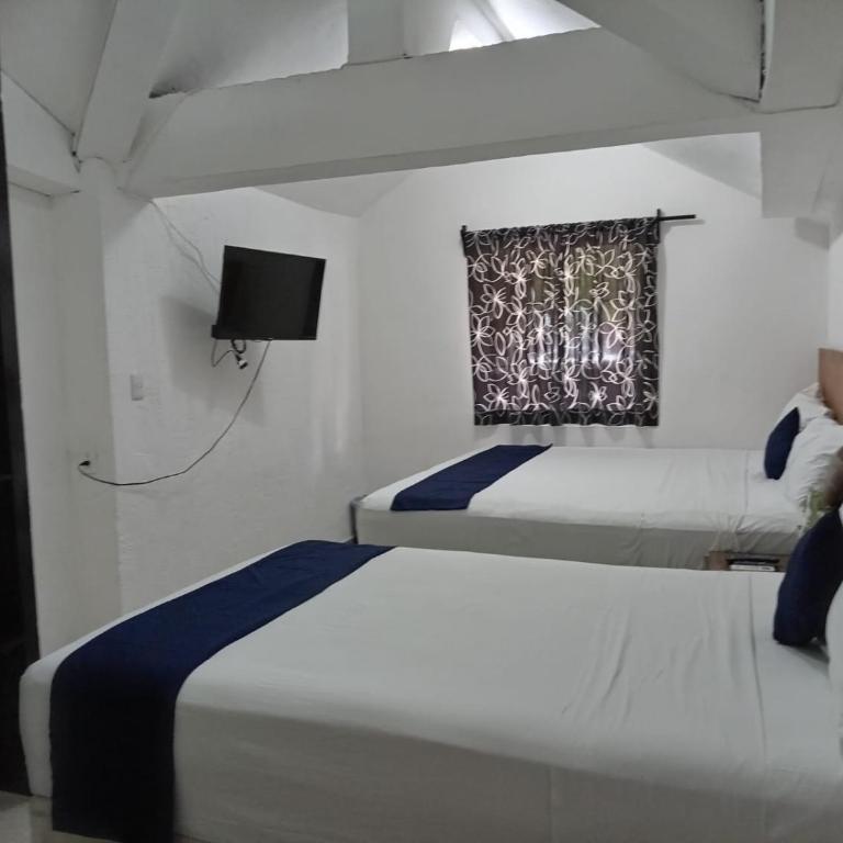 Íkaro Suites Cancún - Habitación Doble - 2 camas - 18