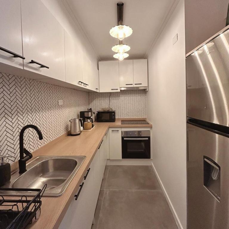 Descubre Santiago desde amplio depto con vista única - Three-Bedroom Apartment - 38