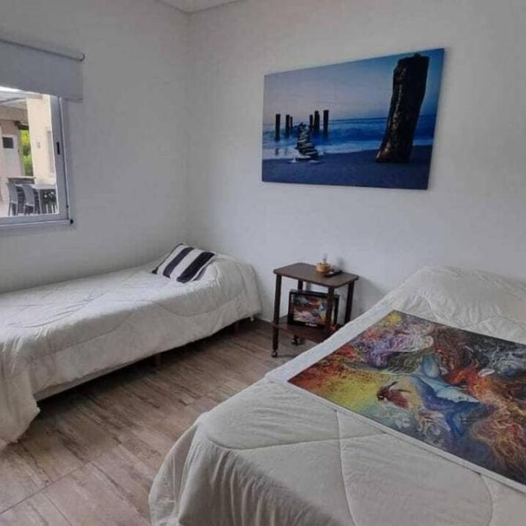 Amplia casa con pileta, parque y acceso a la playa - Three-Bedroom House - 14