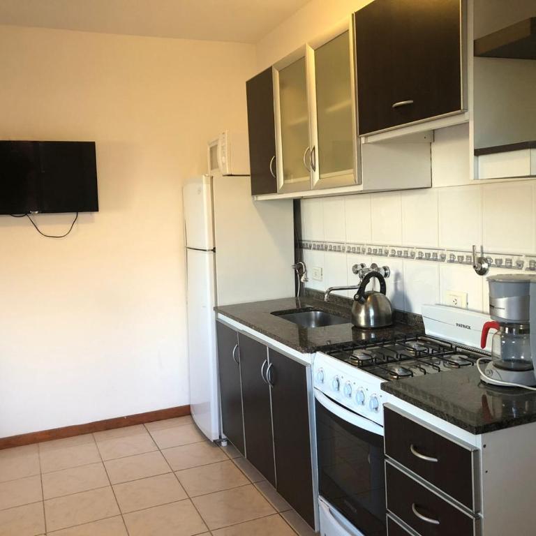 En Esta Tierra - One-Bedroom Apartment - 1