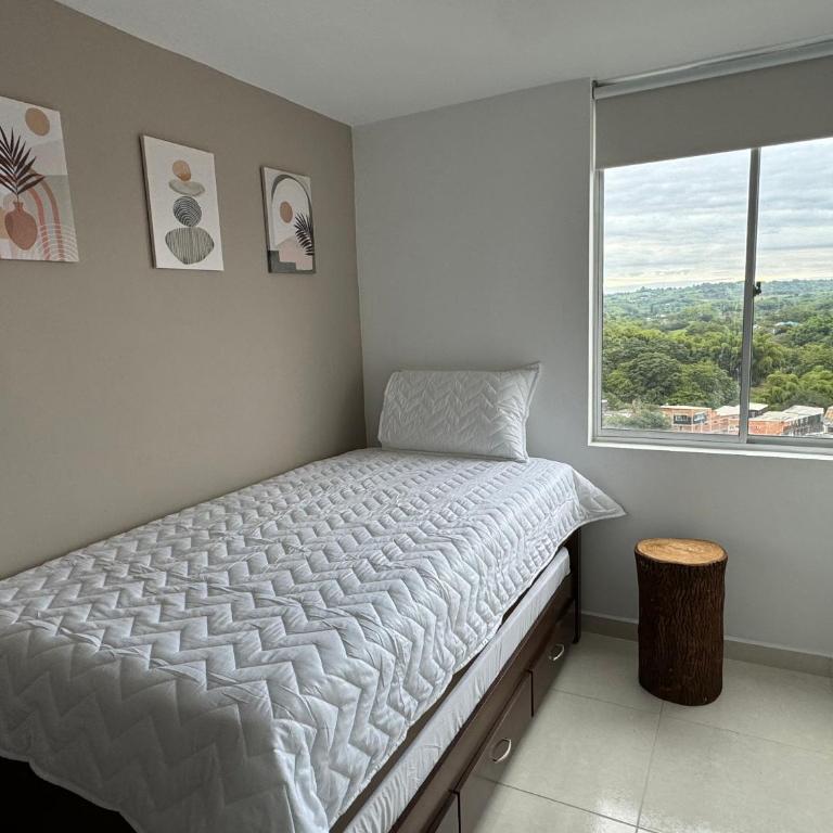 Refugio Central con Parqueo Privado - Apartamento de 2 dormitorios - 3