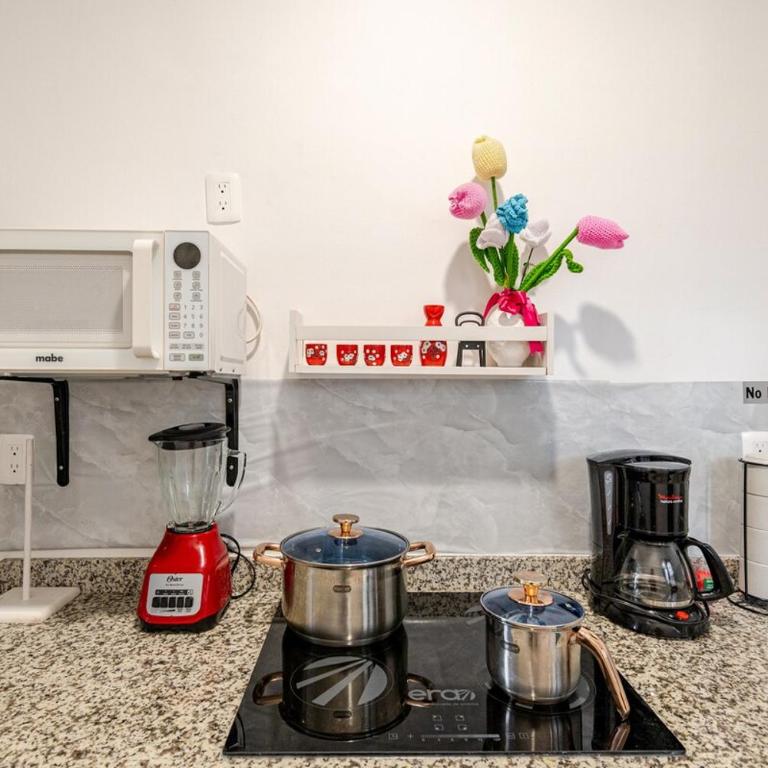 Real Amalfi coto 3 a 13 min de la Playa con salida a Cancun y Tulum 49 amenidades - Two-Bedroom Apartment - 26