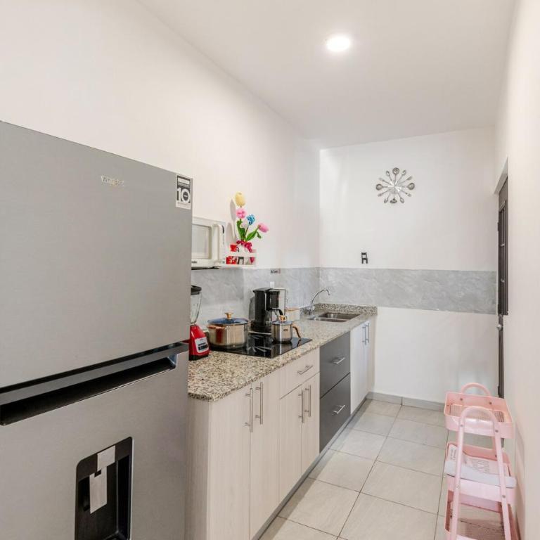 Real Amalfi coto 3 a 13 min de la Playa con salida a Cancun y Tulum 49 amenidades - Two-Bedroom Apartment - 24