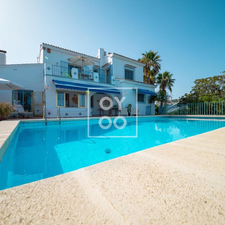 Villa El Monte de Moraira, private pool, sea views - by OYOOSTAYS - Three-Bedroom Vacation Home - 1