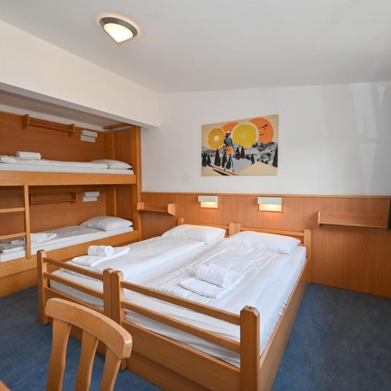 Schmitten 27 Rooms & Apartments by All in One Apartments - Comfort Vierbettzimmer - 1