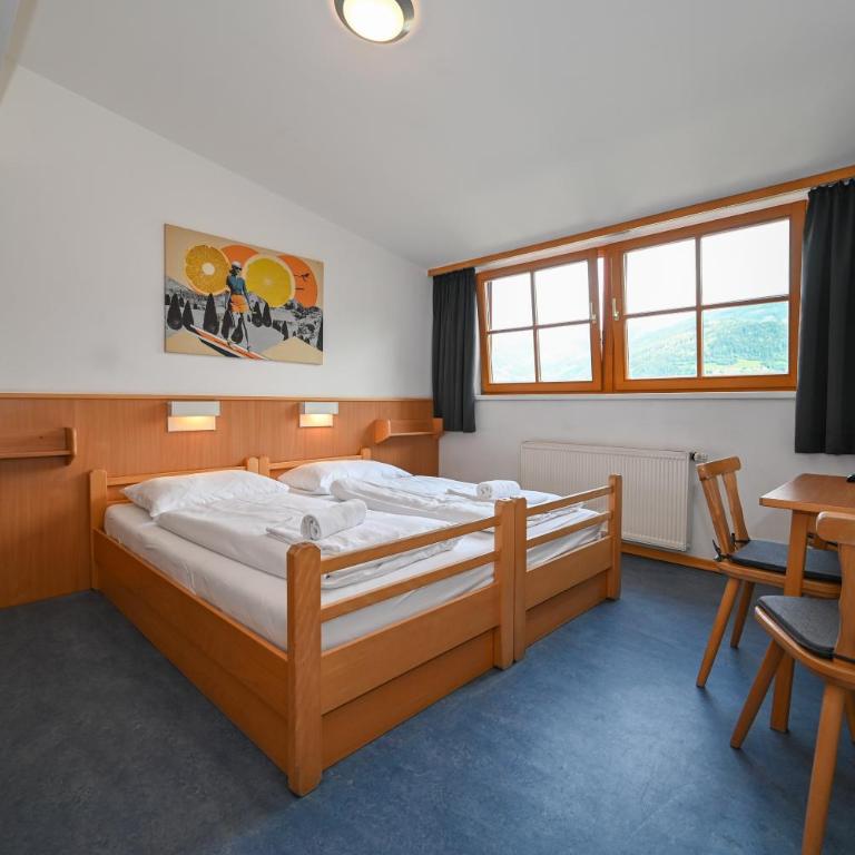 Schmitten 27 Rooms & Apartments by All in One Apartments - Comfort Vierbettzimmer - 4