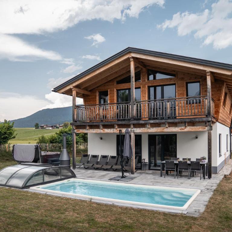 Chalet Bergherzerl im Chiemgau mit Sommerpool, Whirlpool, Sauna und eingezäuntem Garten - Chalet mit 3 Schlafzimmern - 1
