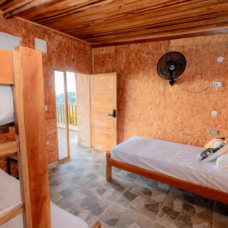 Cabaña en el paraiso - Habitación Familiar con terraza - 1