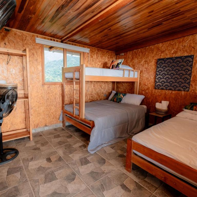 Cabaña en el paraiso - Habitación Familiar con terraza - 4