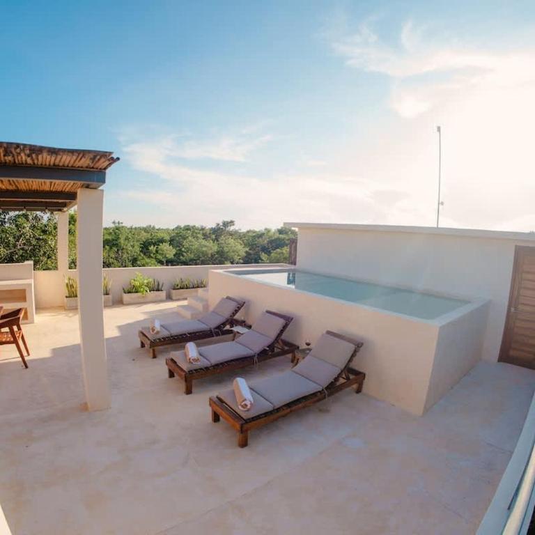 Elegant 3BR Penthouse Haven with Private Rooftop Pool & Jungle Views - Apartamento - 11