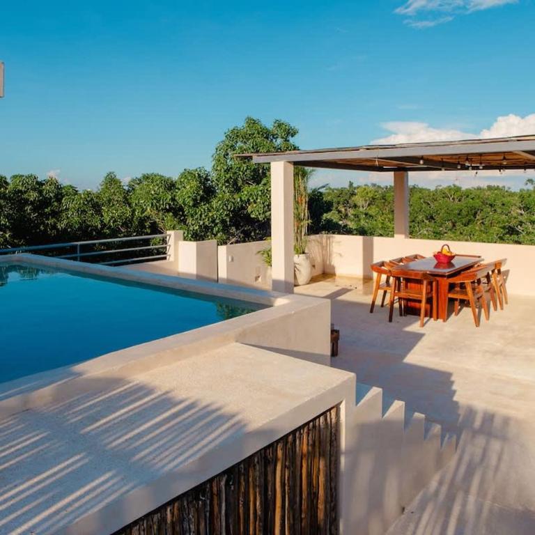 Elegant 3BR Penthouse Haven with Private Rooftop Pool & Jungle Views - Apartamento - 39