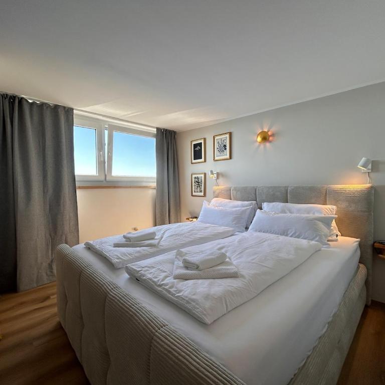 Appartement WOLKE7 byTILLY - Familienfreundliches Alpenzuhause mit Hallenbad, Balkon & Panoramablick hoch oben auf der Gerlitzen - Apartment mit 2 Schlafzimmern und Balkon - 5