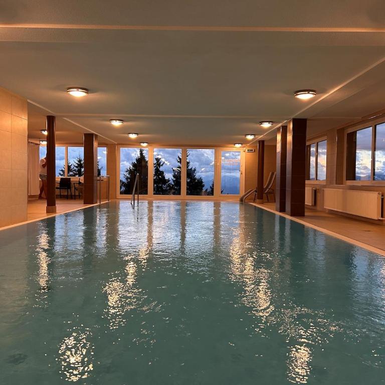 Appartement WOLKE7 byTILLY - Familienfreundliches Alpenzuhause mit Hallenbad, Balkon & Panoramablick hoch oben auf der Gerlitzen - Apartment mit 2 Schlafzimmern und Balkon - 2