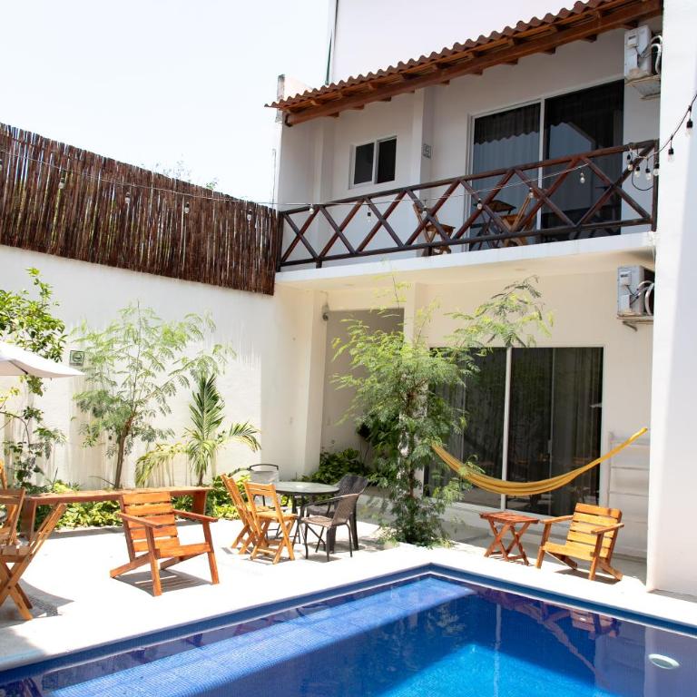 CASA GUAJE 5min to Beach Bacocho and Coral 3Floor House 6 Bedrooms all with AC 8 beds up to 16 Guests Wifi starlink - Apartamento - 1